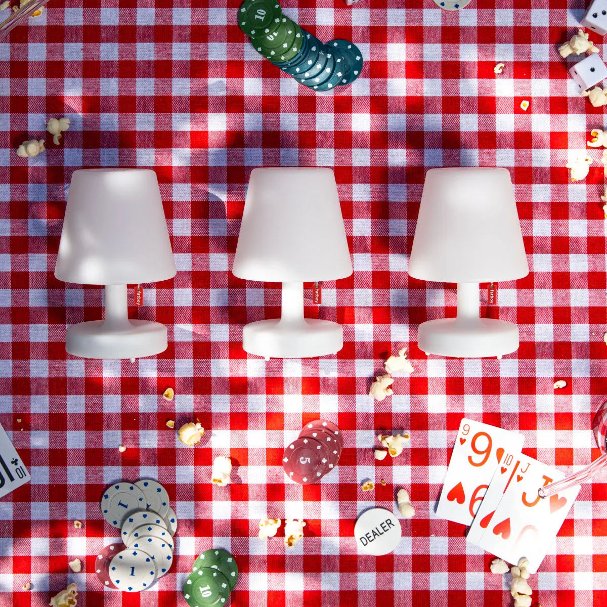 Fatboy Edison the Mini Rechargeable LED Lamps on Outdoor Table